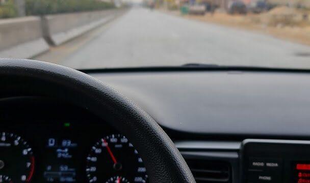 a steering wheel and dashboard of a car