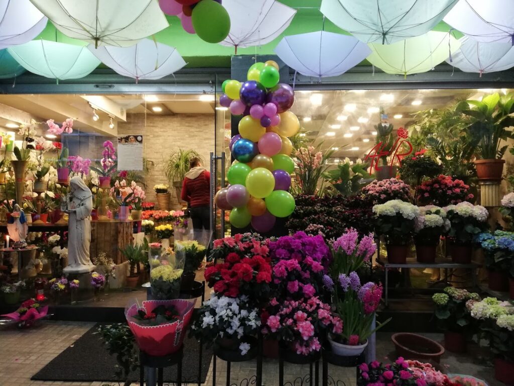 a store with flowers and balloons