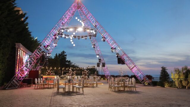 a large structure with tables and chairs