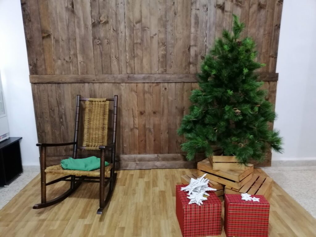 a christmas tree and presents in a room