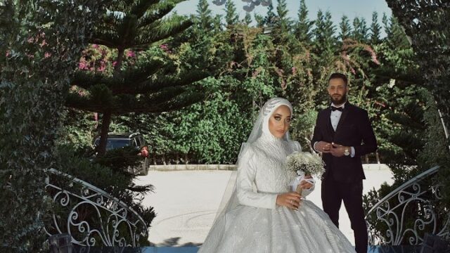 a man and woman in a wedding dress