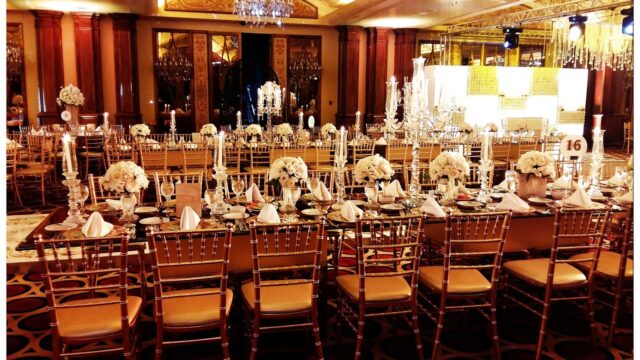 A long table set for a wedding reception with Beydoun Chairs كراسي بيضون.