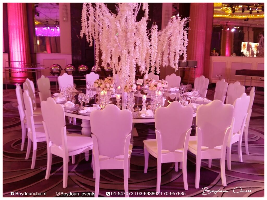 A table set for a party with Beydoun Chairs كراسي بيضون.