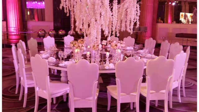 A table set for a party with Beydoun Chairs كراسي بيضون.