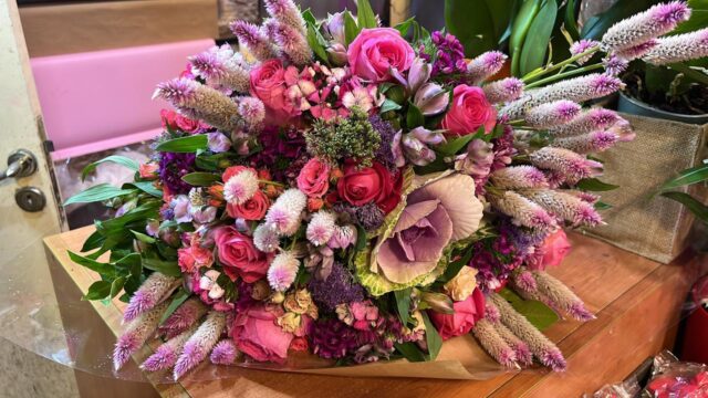 a bouquet of flowers on a table