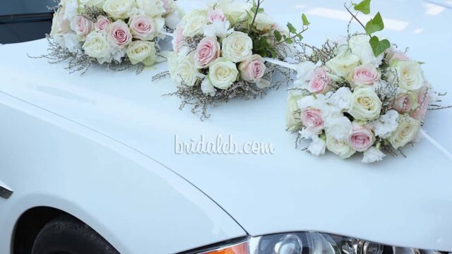 a group of flowers on a car