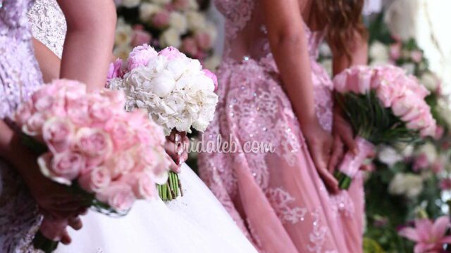 a group of women holding flowers