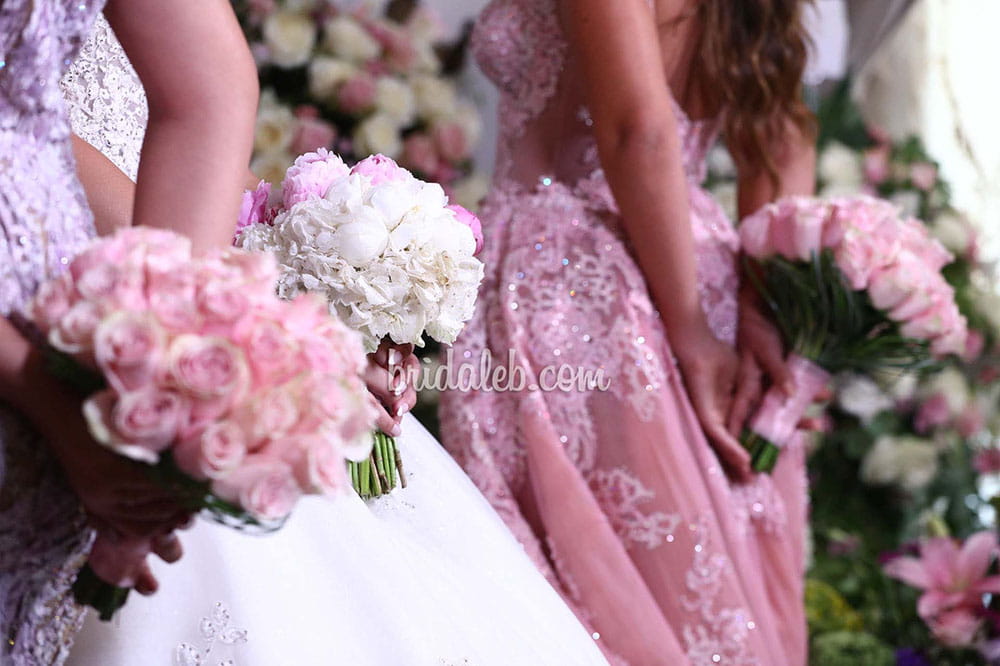 a group of women holding flowers