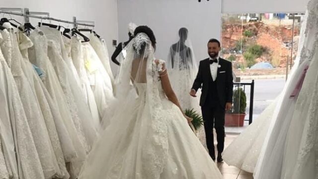 a man and woman in a wedding dress