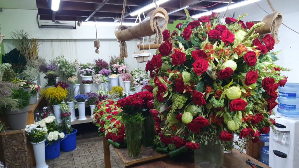 a large bouquet of flowers in a flower shop