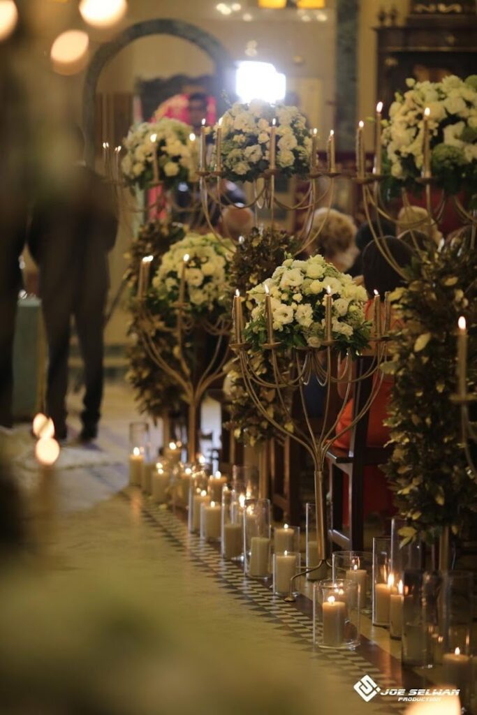 a group of candles and flowers