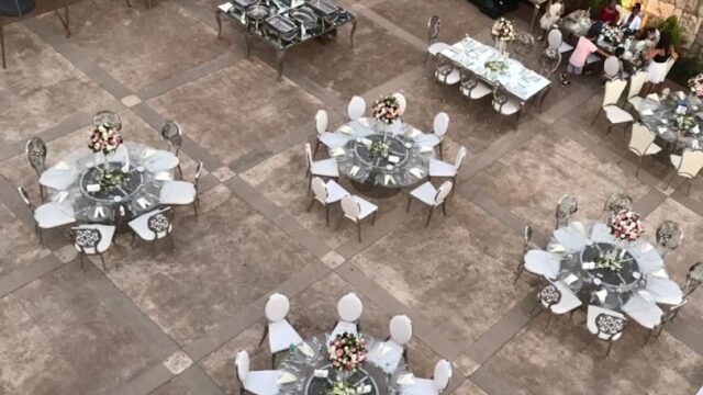 a group of people sitting around tables