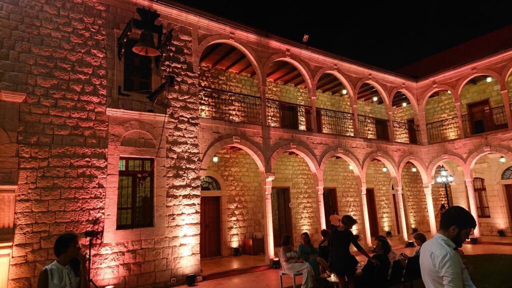 a building with arches and lights