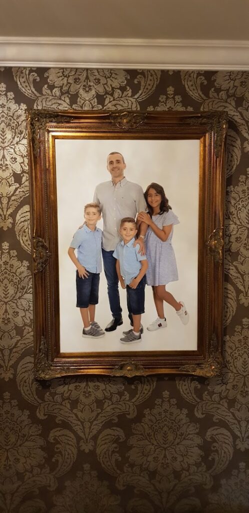 a picture of a family in a frame