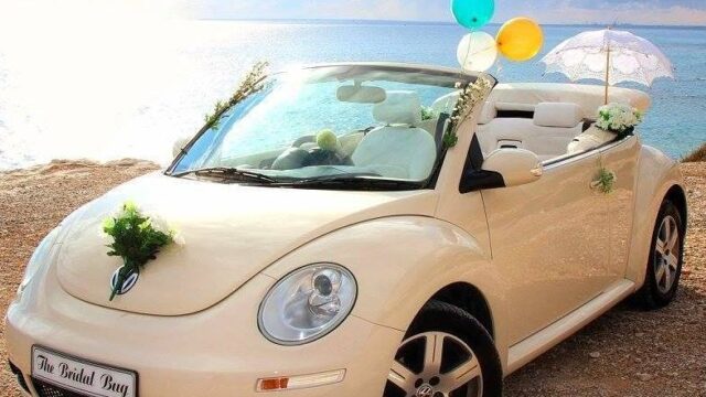 a car with balloons on the roof