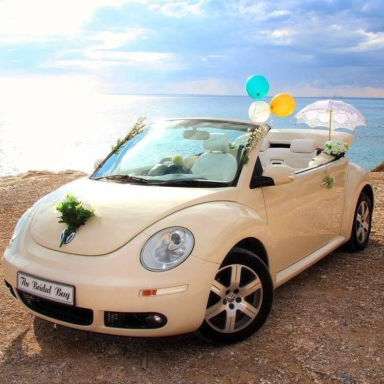 a car with balloons on the roof