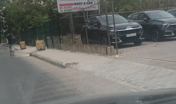 a car parked on the side of a road