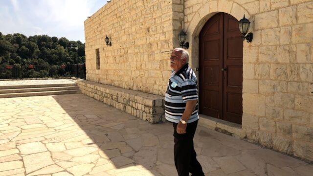 a man walking outside a building