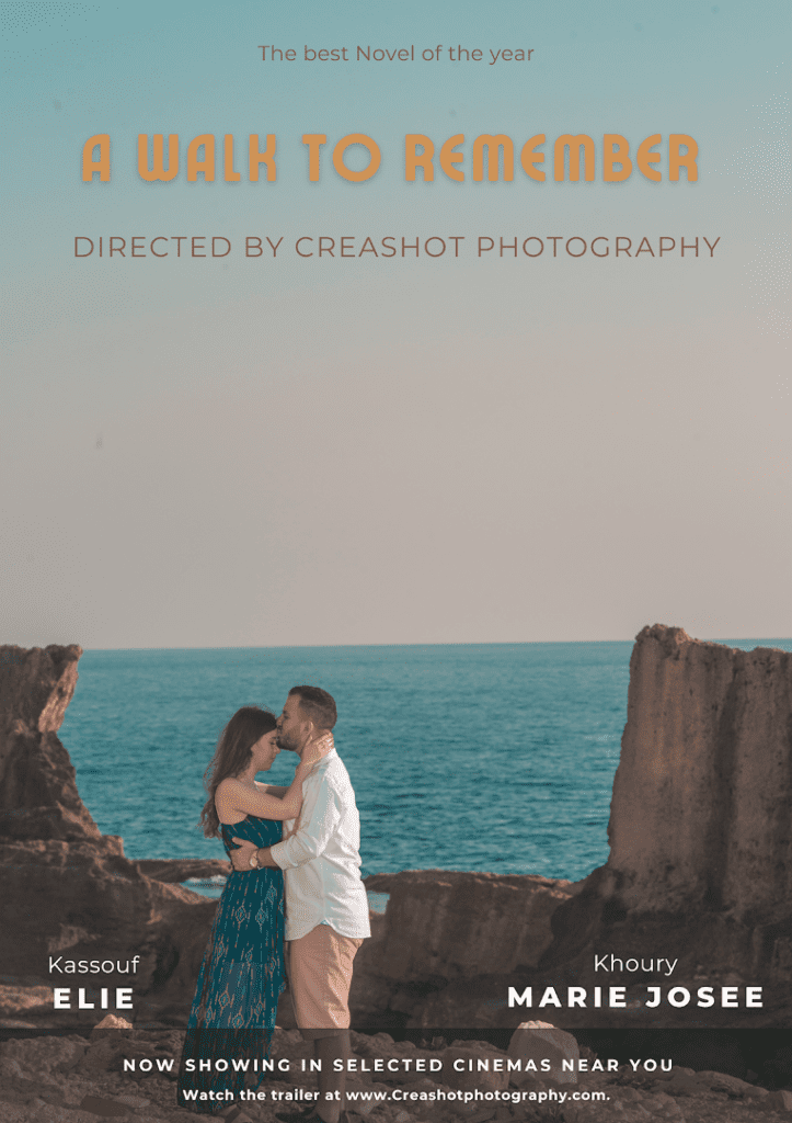 a man and woman kissing on a beach