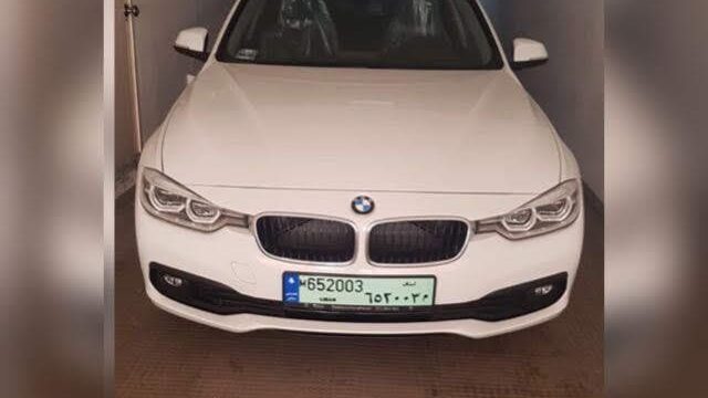 a white car parked in a garage