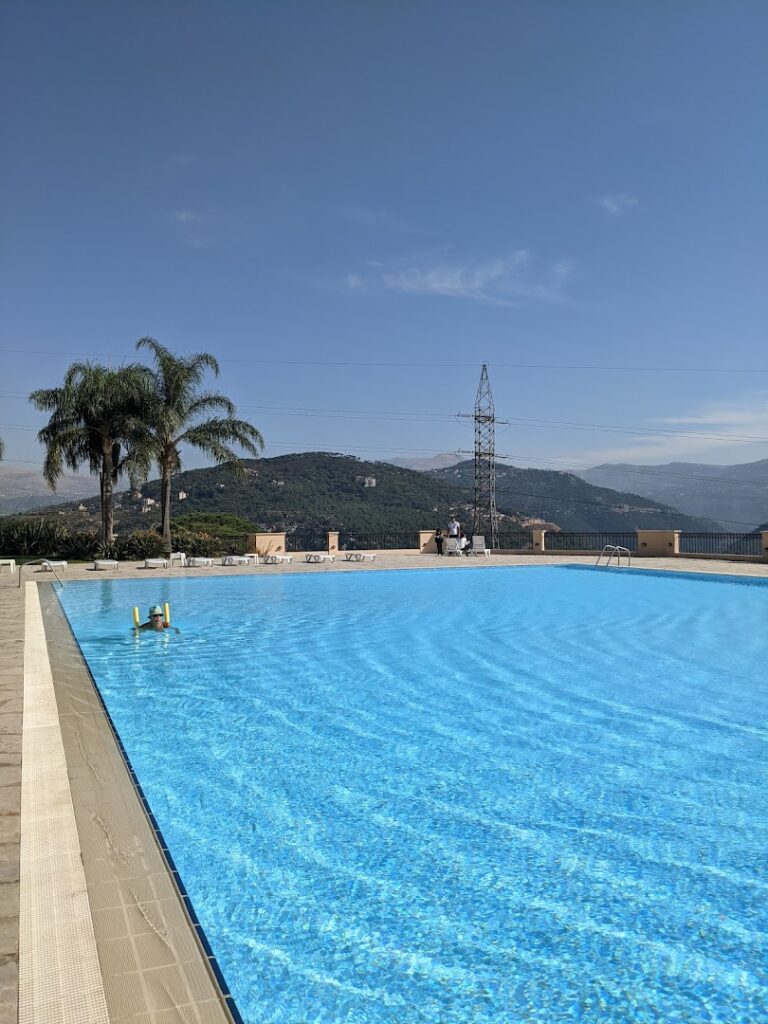 a pool with a couple of people in it