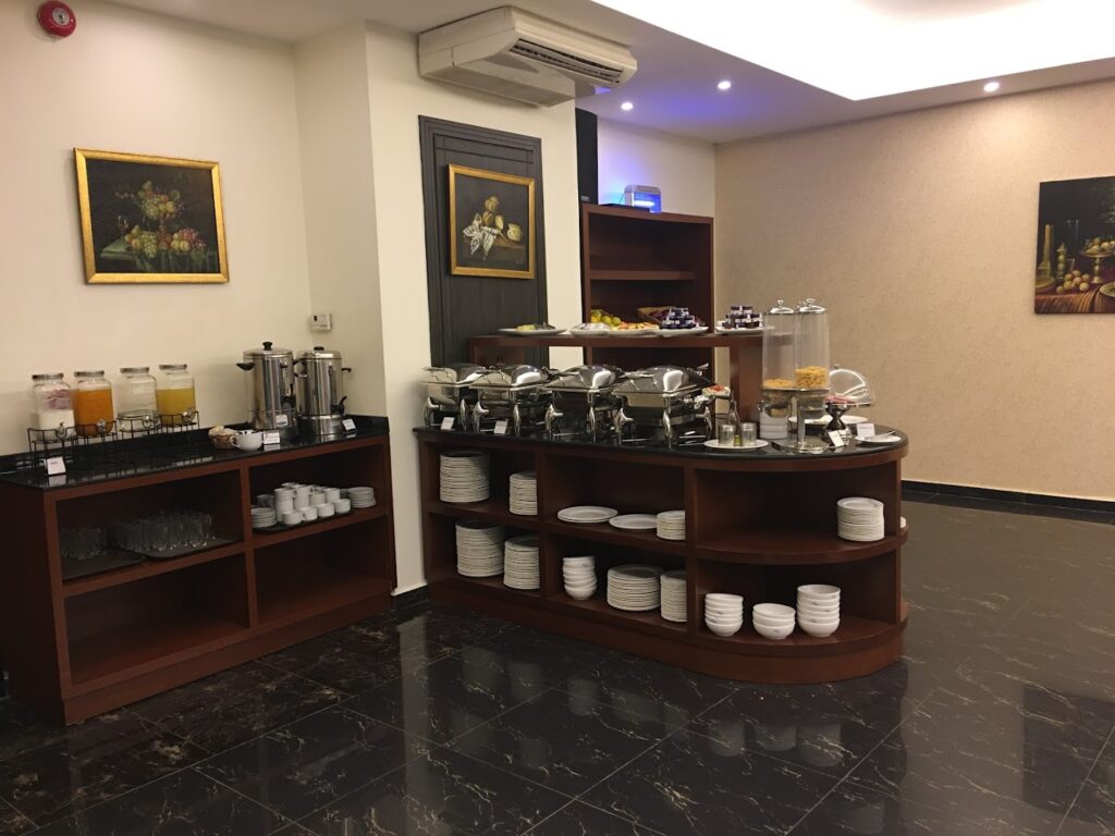 a buffet table with food on shelves