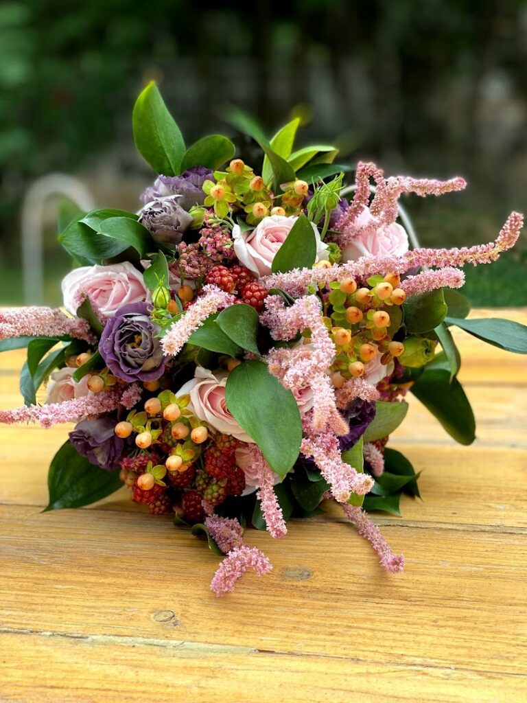 a bouquet of flowers on a table