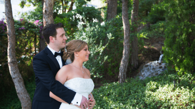 a man and woman in wedding attire