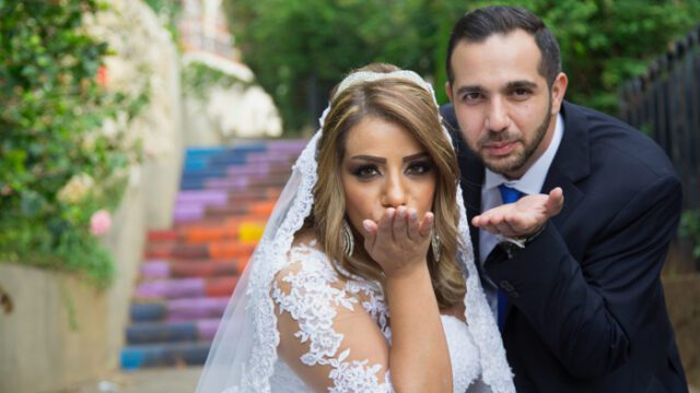 a man and woman posing for a picture