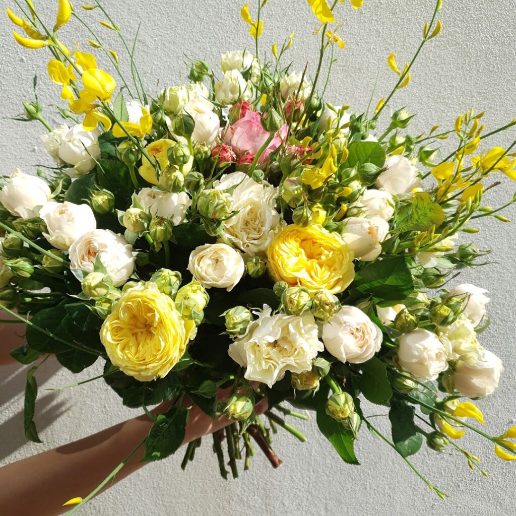 a bouquet of flowers in a hand