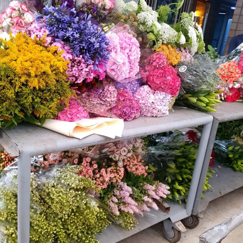 a bunches of flowers on a table