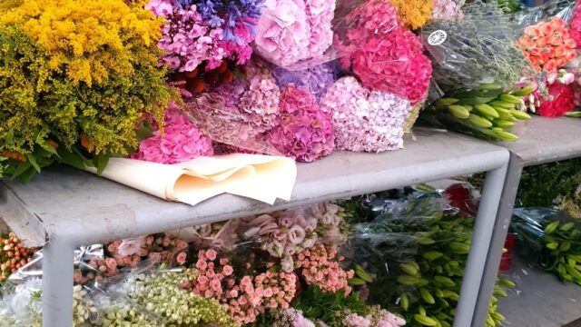 a bunches of flowers on a table