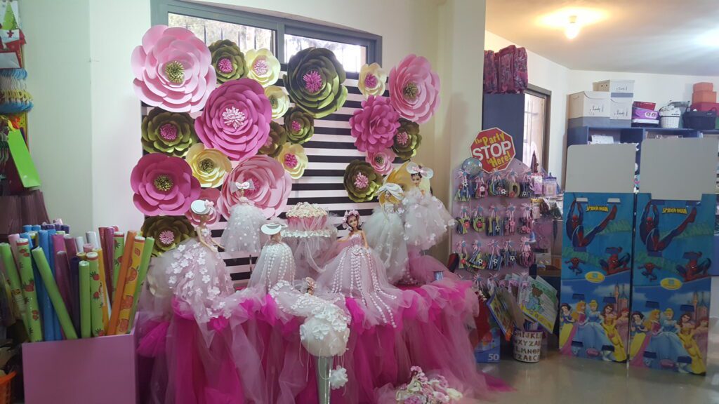 a display of pink and white flowers