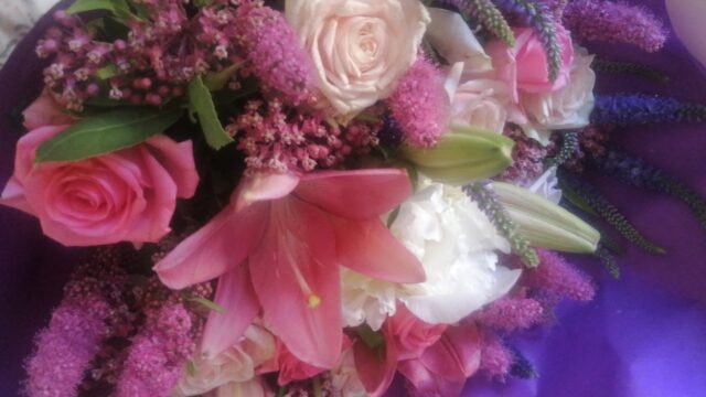 a bouquet of flowers on a table