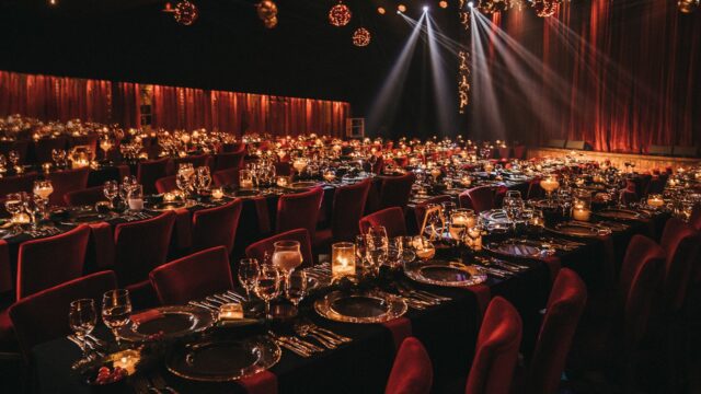 a large room with tables and chairs