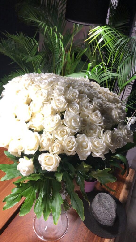 a large bouquet of white roses