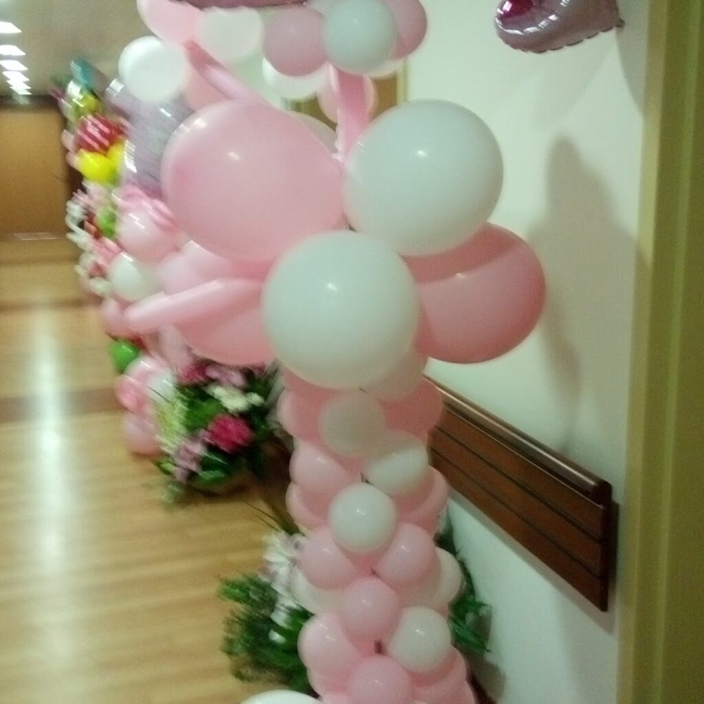 a group of balloons on a wall