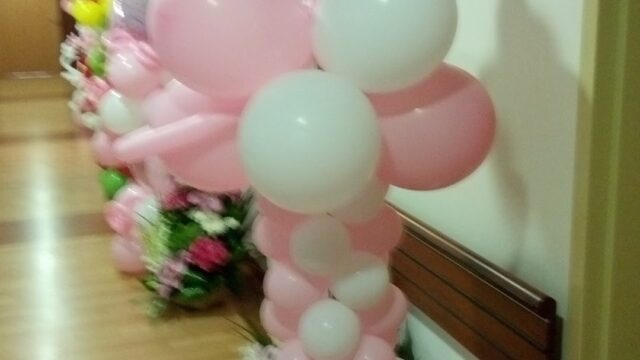 a group of balloons on a wall