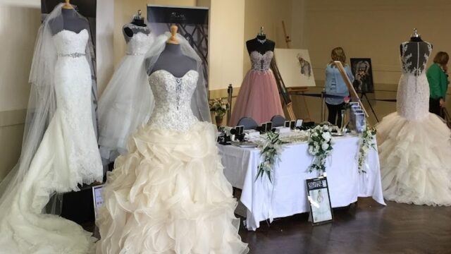 a wedding dress on mannequins