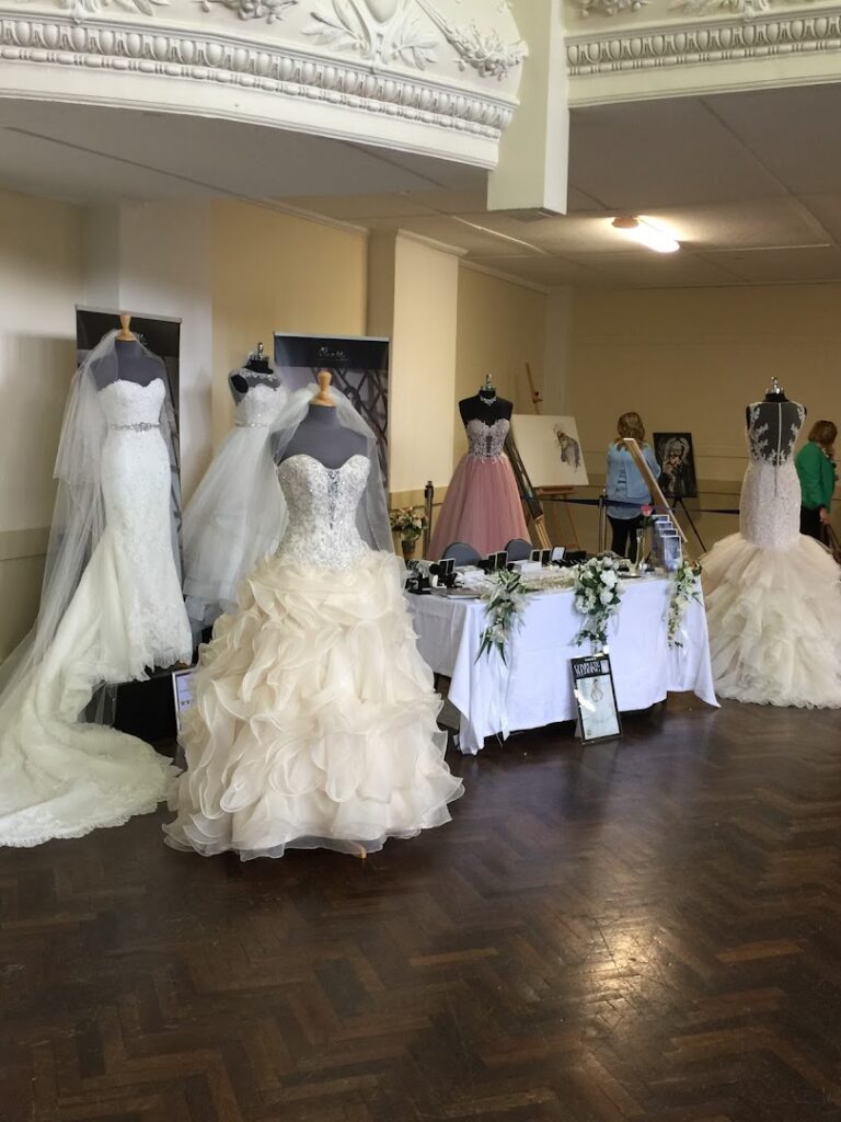 a wedding dress on mannequins