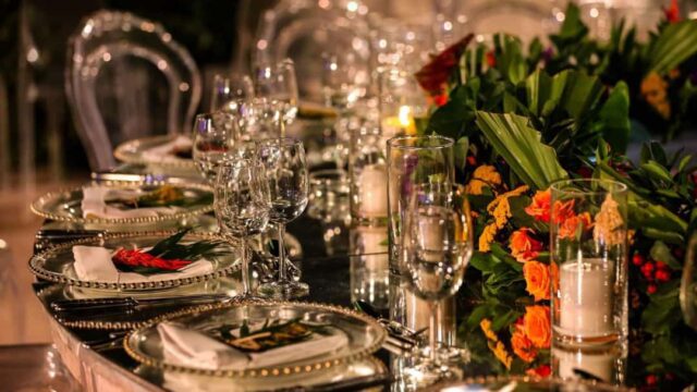 a table with plates and glasses