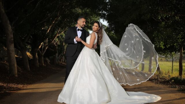 a man and woman in wedding attire