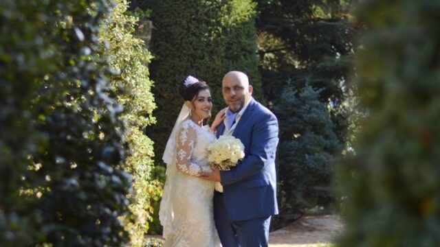 a man and woman in wedding attire