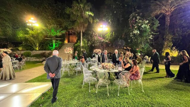 a group of people at a dinner party