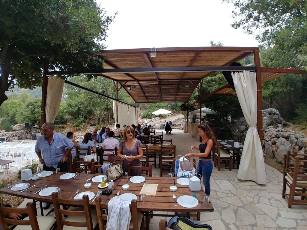 a group of people outside a restaurant