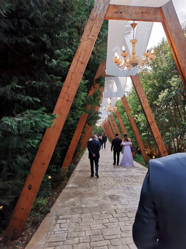 a group of people walking down a walkway