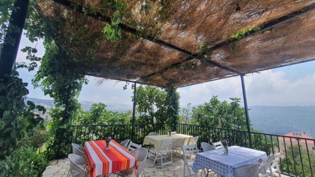 a table and chairs on a patio