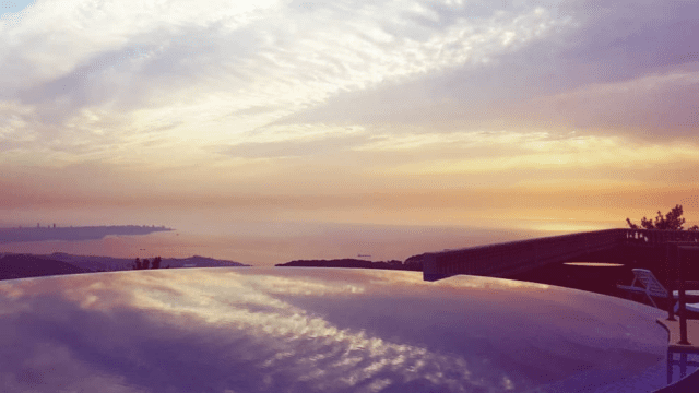 a view of the ocean from a rooftop