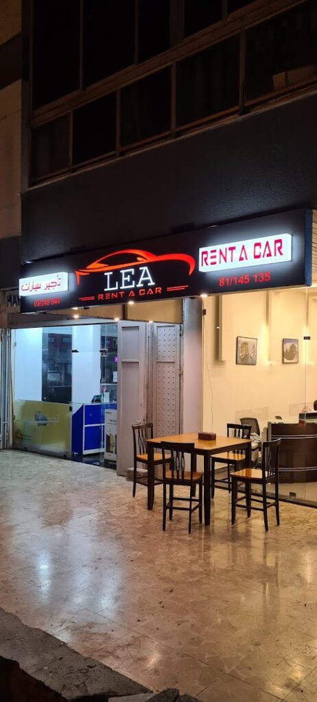 a restaurant with tables and chairs outside