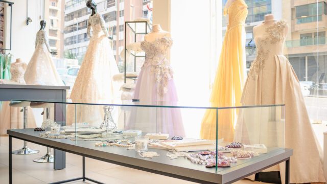 a mannequins in a store with dresses